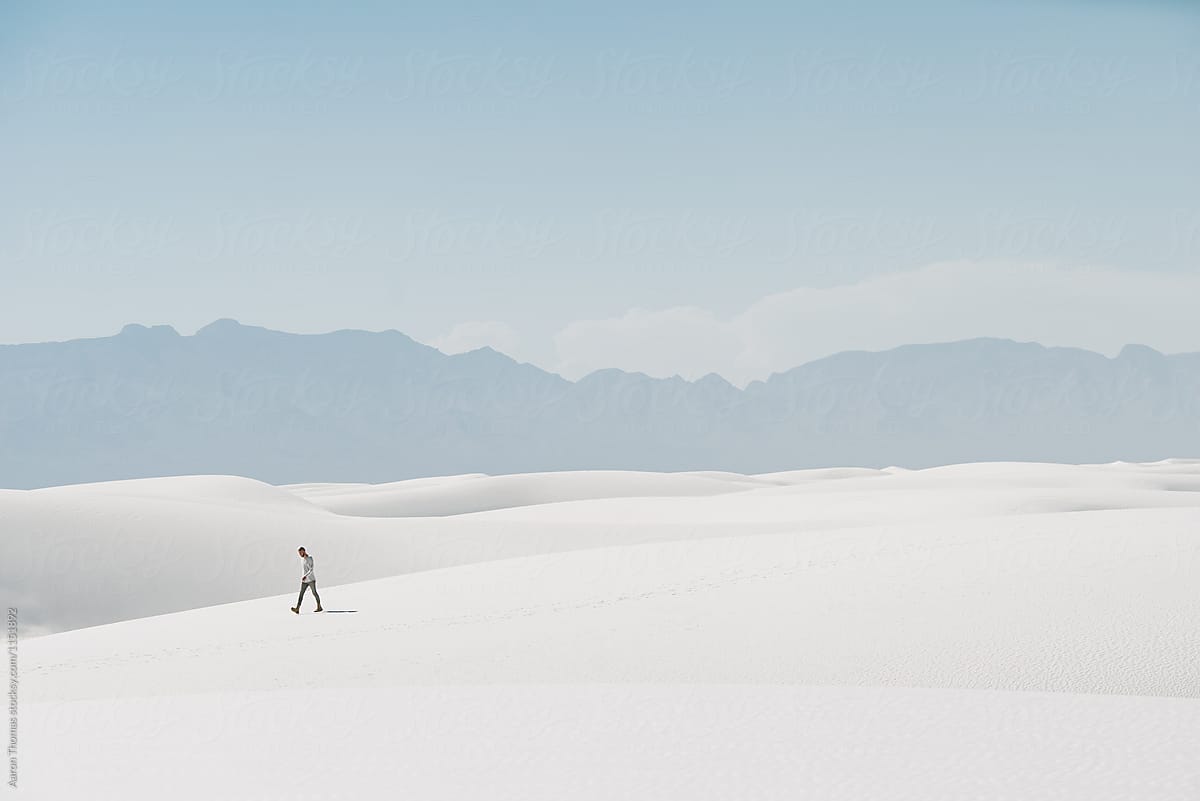 Man walking along in the desert