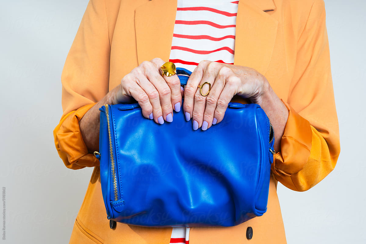 detail of Senior Woman with Blue Handbag