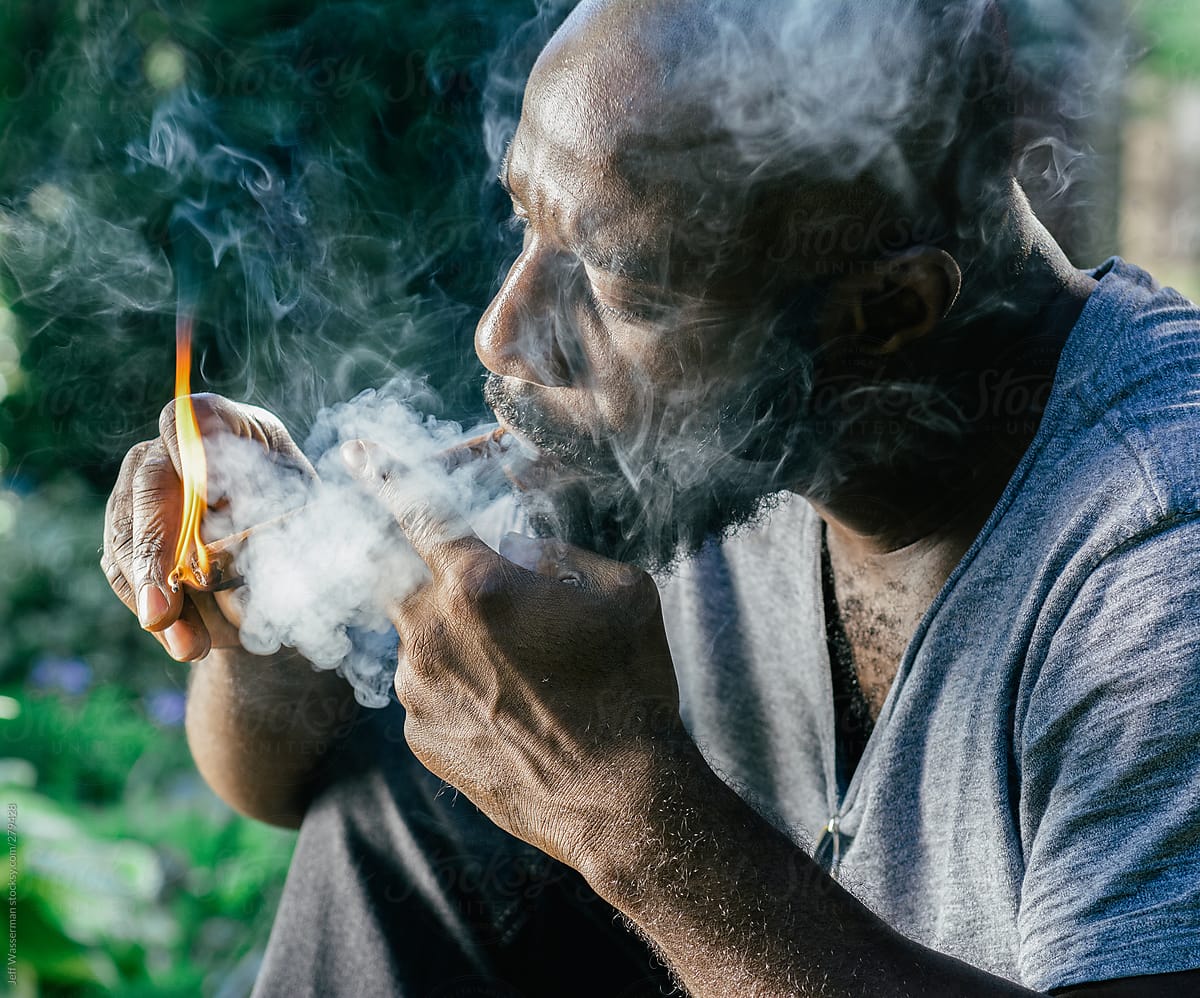 Man Lighting Cigar
