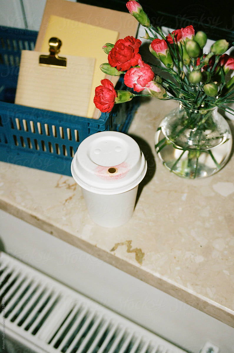 Film photo. Flowers and a cup of coffee