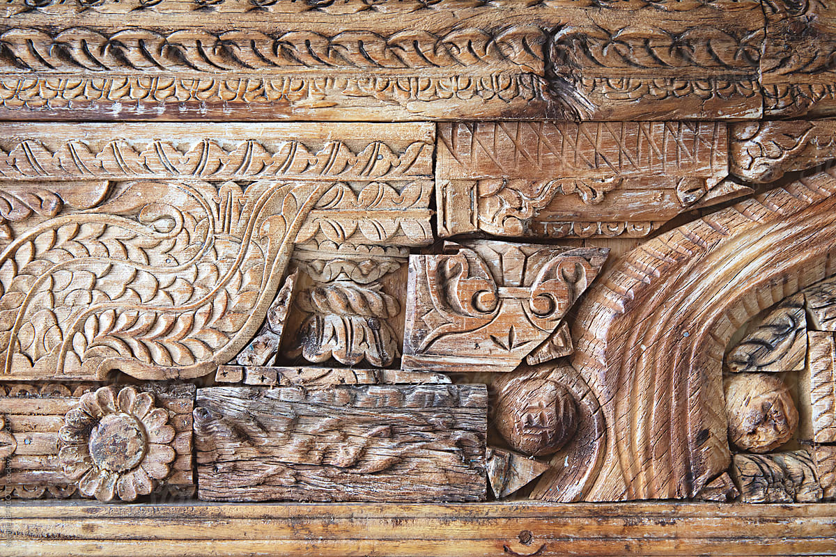 Close up of hand carved wooden pattern on Indian furniture