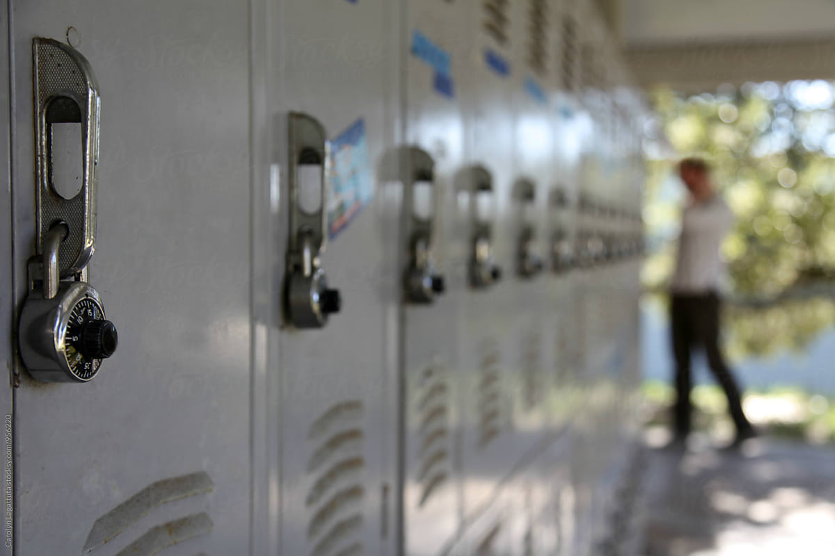 Lockers at a school with a student