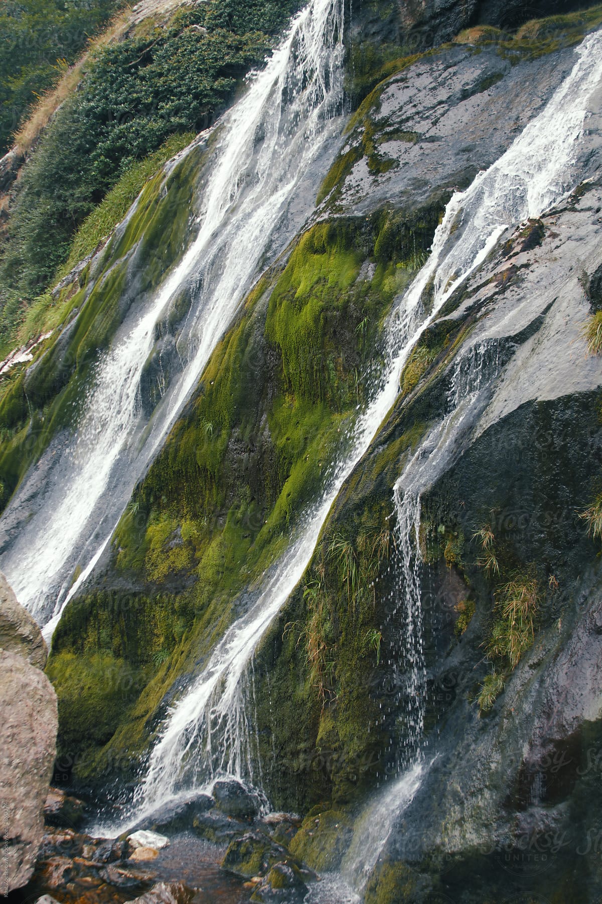 Beautiful high waterfall cascading down a mountainside in Ireland