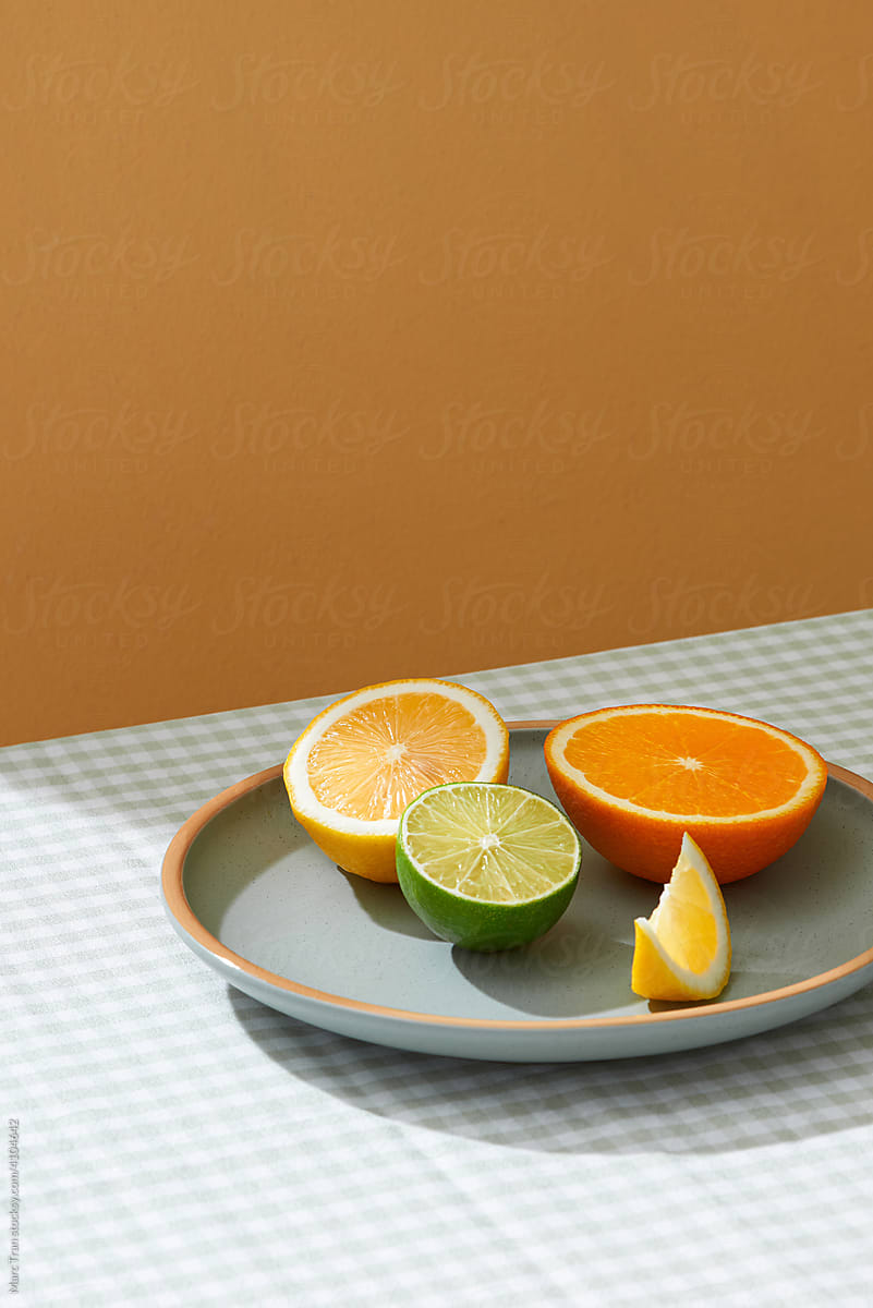 Vibrant citrus half cut fruits on table