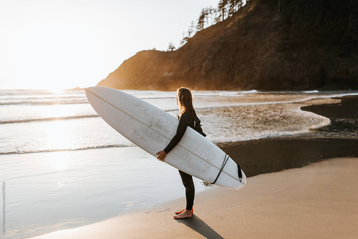 Girl With Surfboard By Stocksy Contributor Caleb Gaskins Stocksy