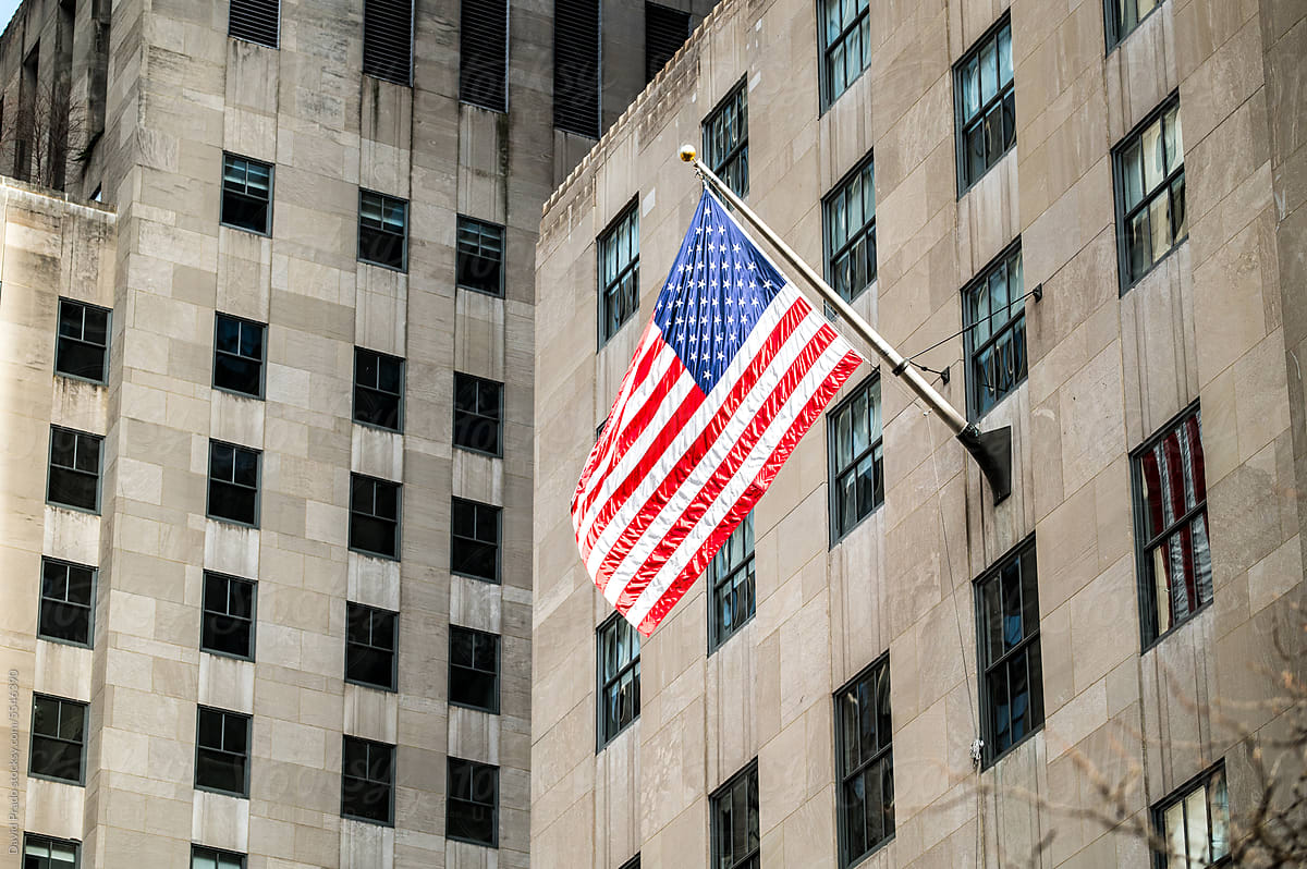 American flag on city building