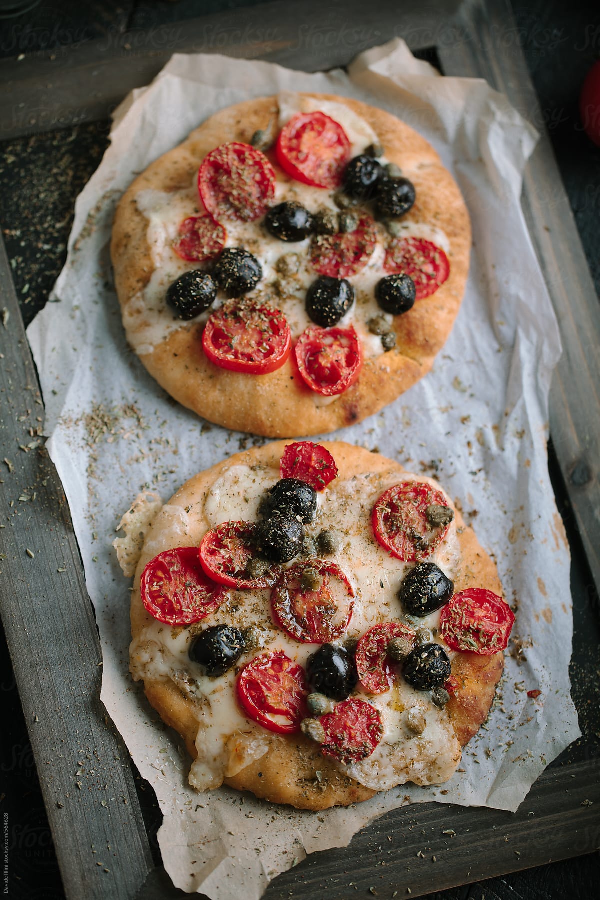 Italian focaccia with black olives and cherry tomatoes