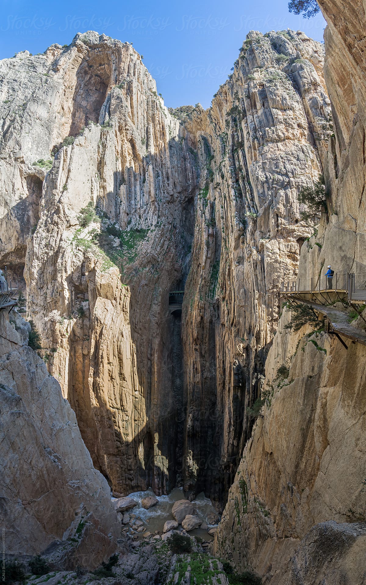 Climber looking at the edge of a cliff in Caminito del Rey