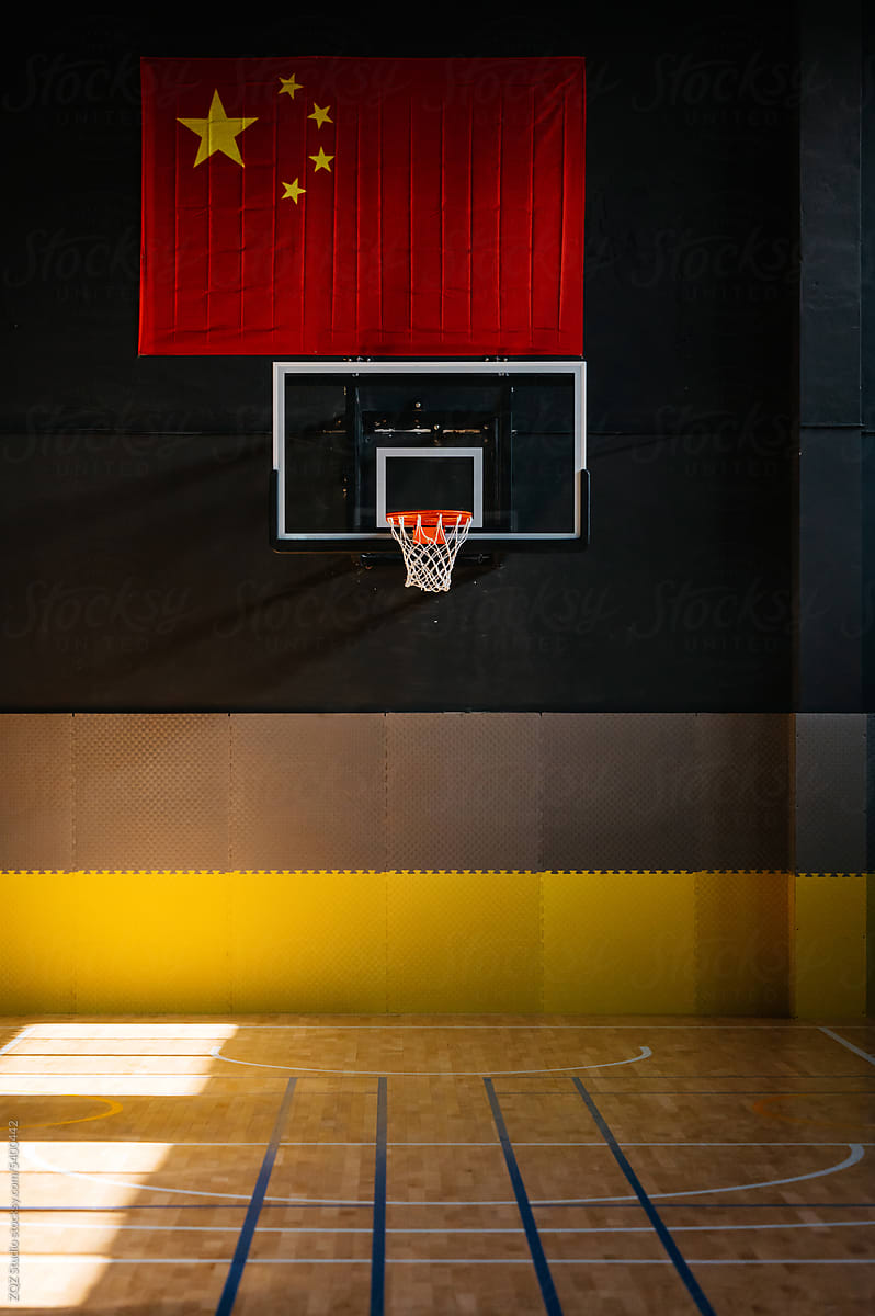 Basketball court with sunlight on the floor