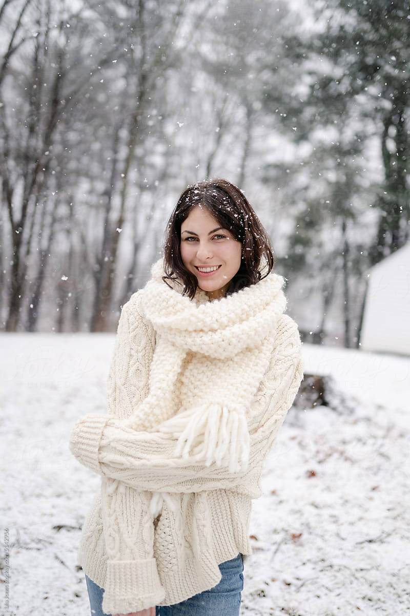 smiling woman in the  snow