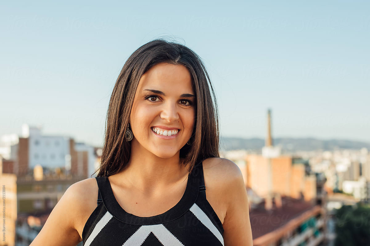 Latin Woman Smiles By Jayme Burrows