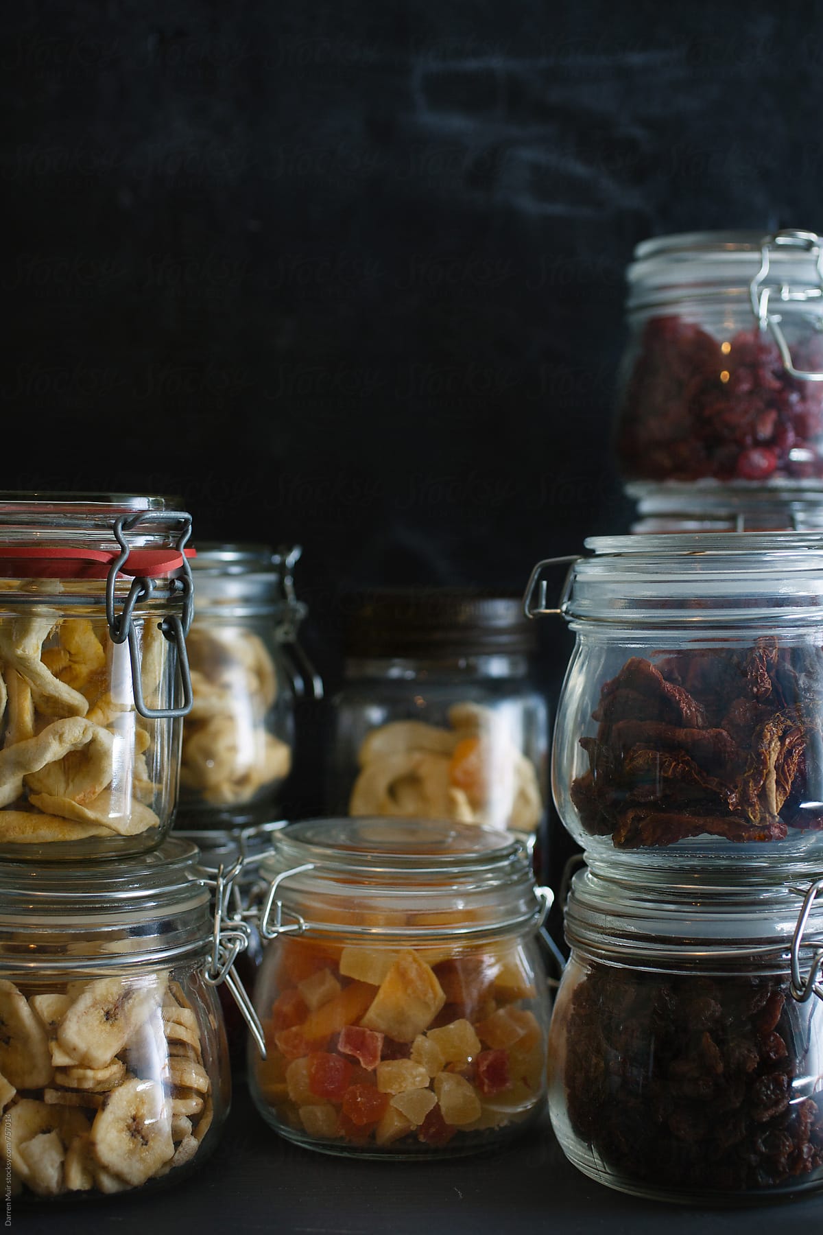 Dry fruit and vegetables: Jars of dehydrated fruit and vegetables in a larder.