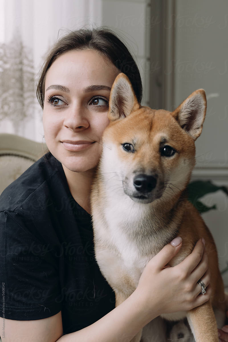 A Portrait Of A Girl With A Dog