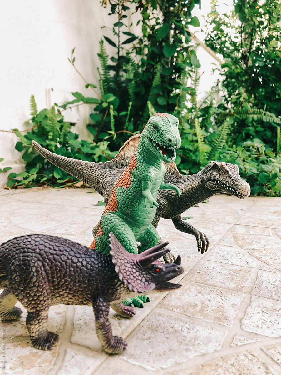 Three Toy Dinos Hunting
