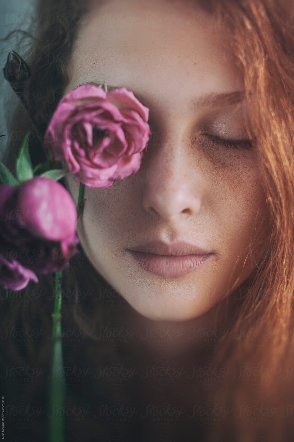 Portrait Of A Beautiful Redhead With Freckles Holding A Rose By Stocksy Contributor Maja 2707
