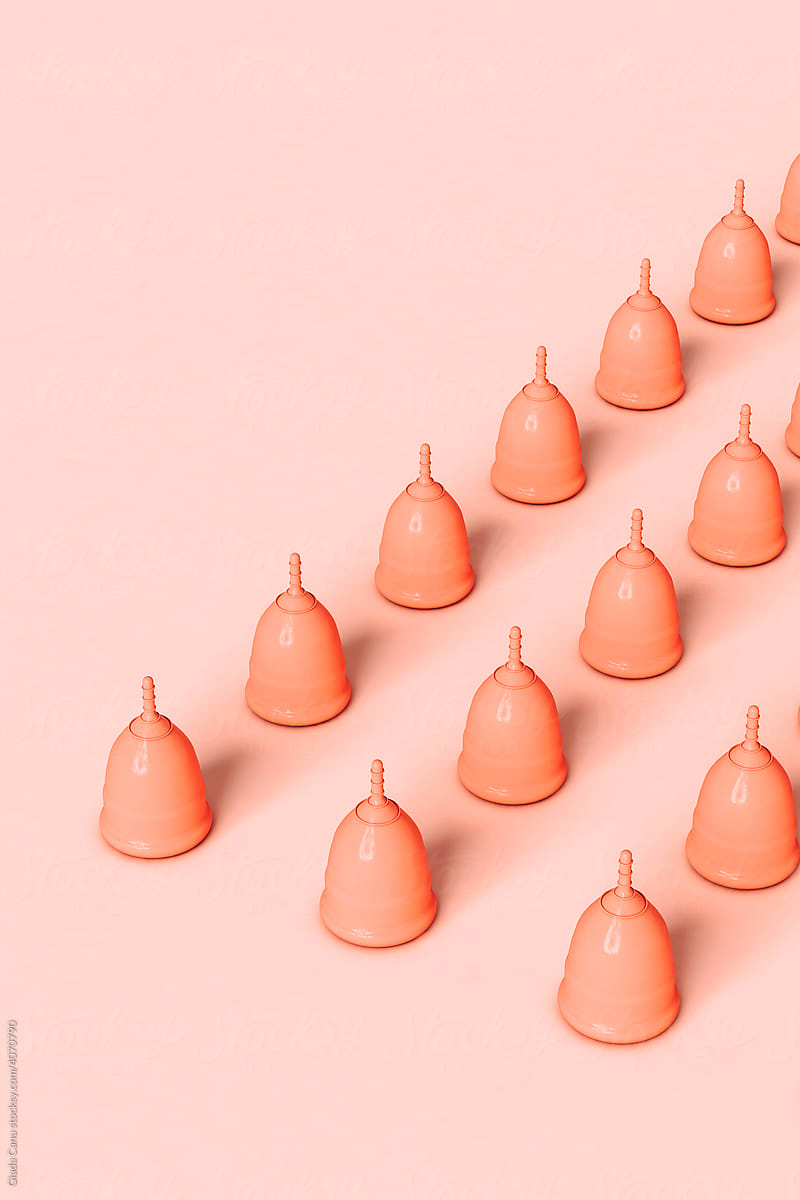 Menstrual cups with copy space on the left