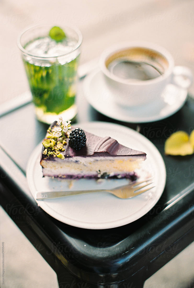 cake, mint tea, and coffee at a cafe