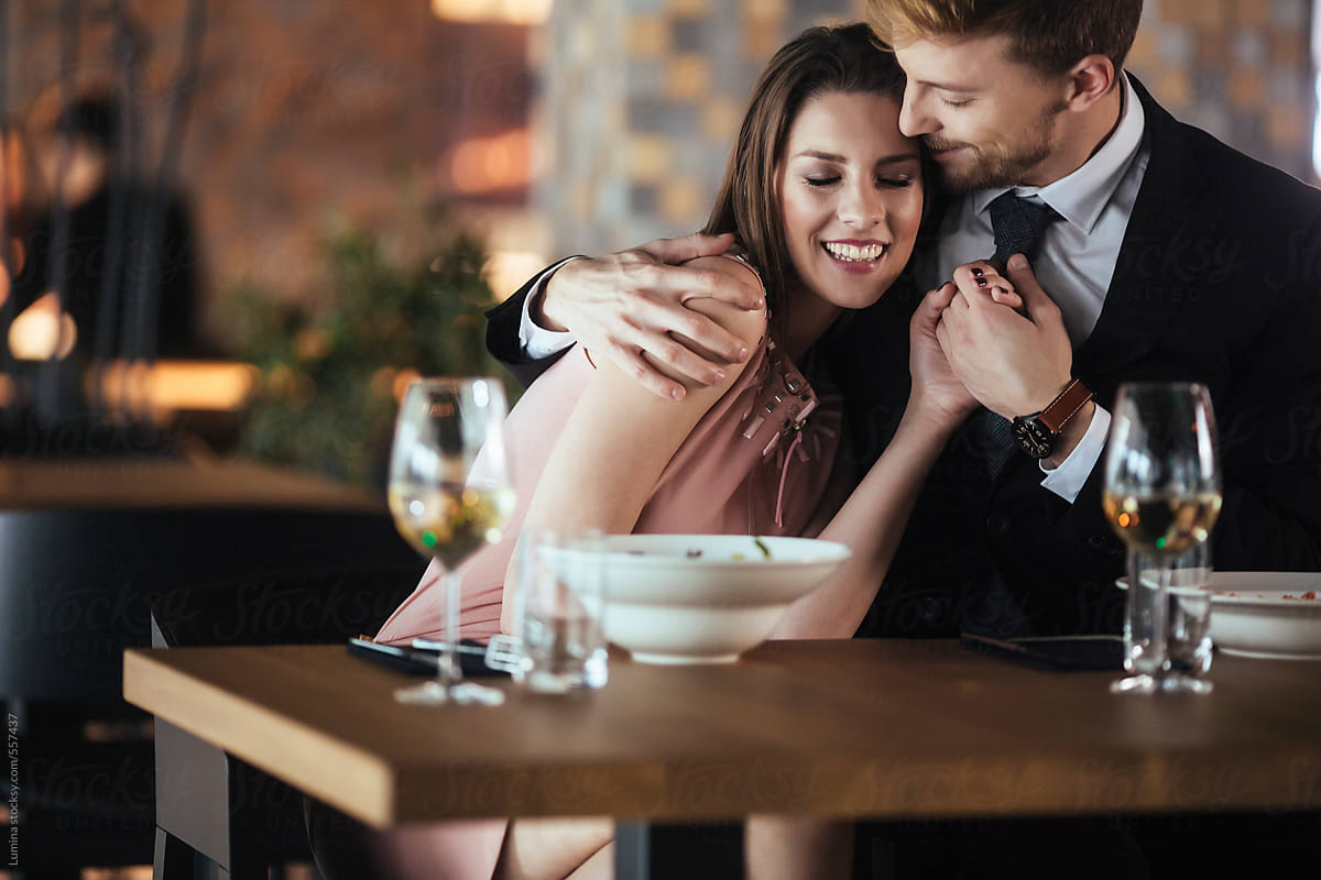Romantic Couple In Love At A Restaurant By Stocksy Contributor