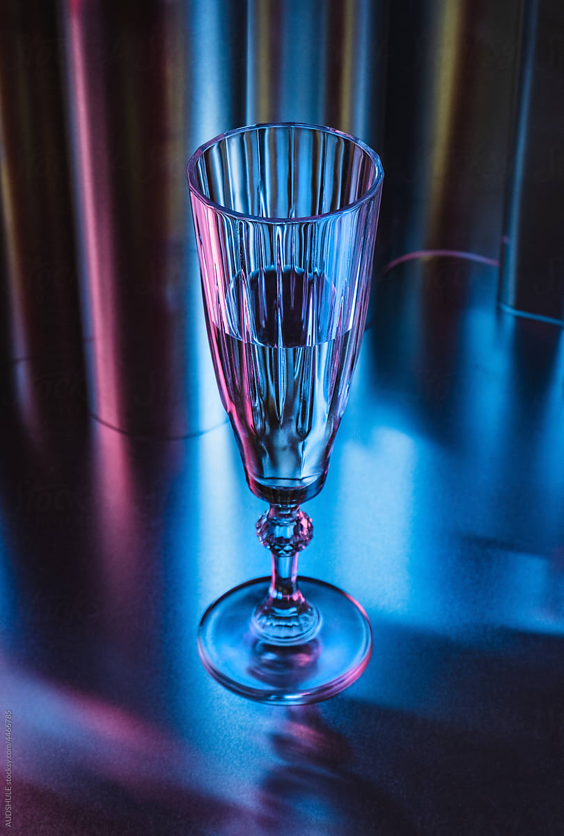 Glass on colorful metallic background  .