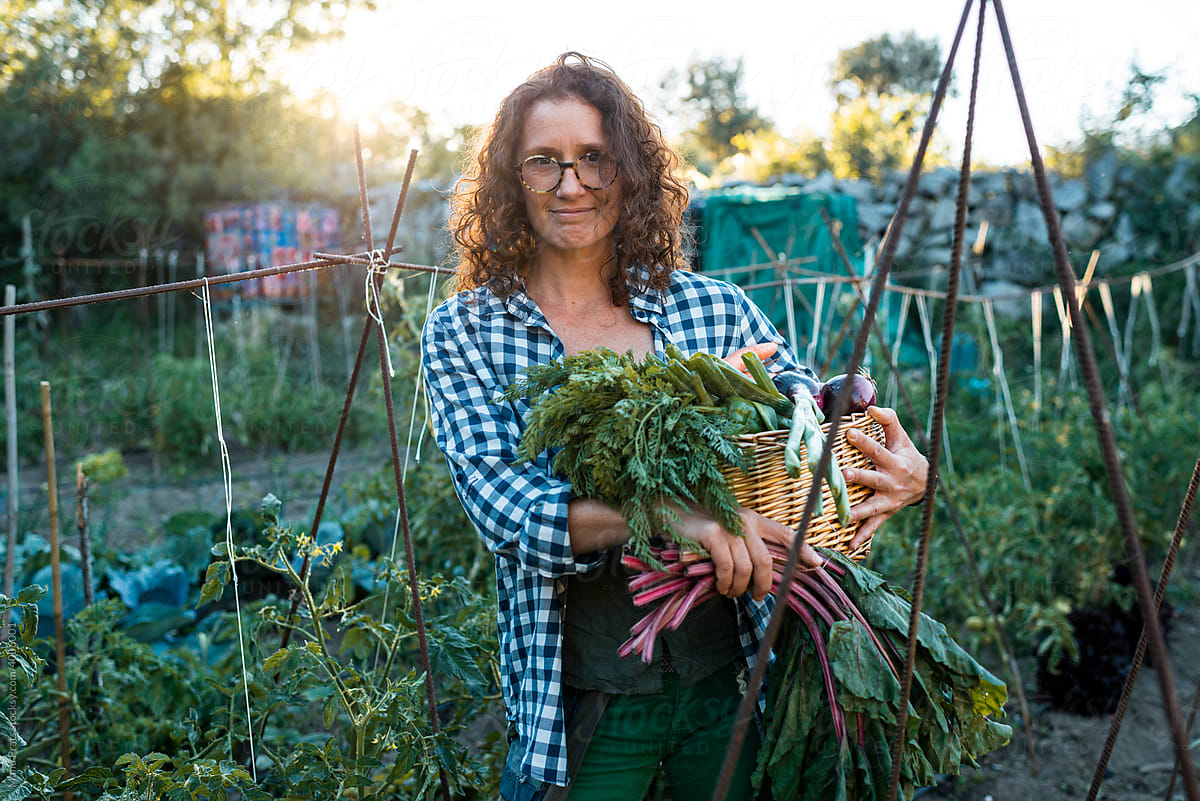 Female gardening organic vegetables