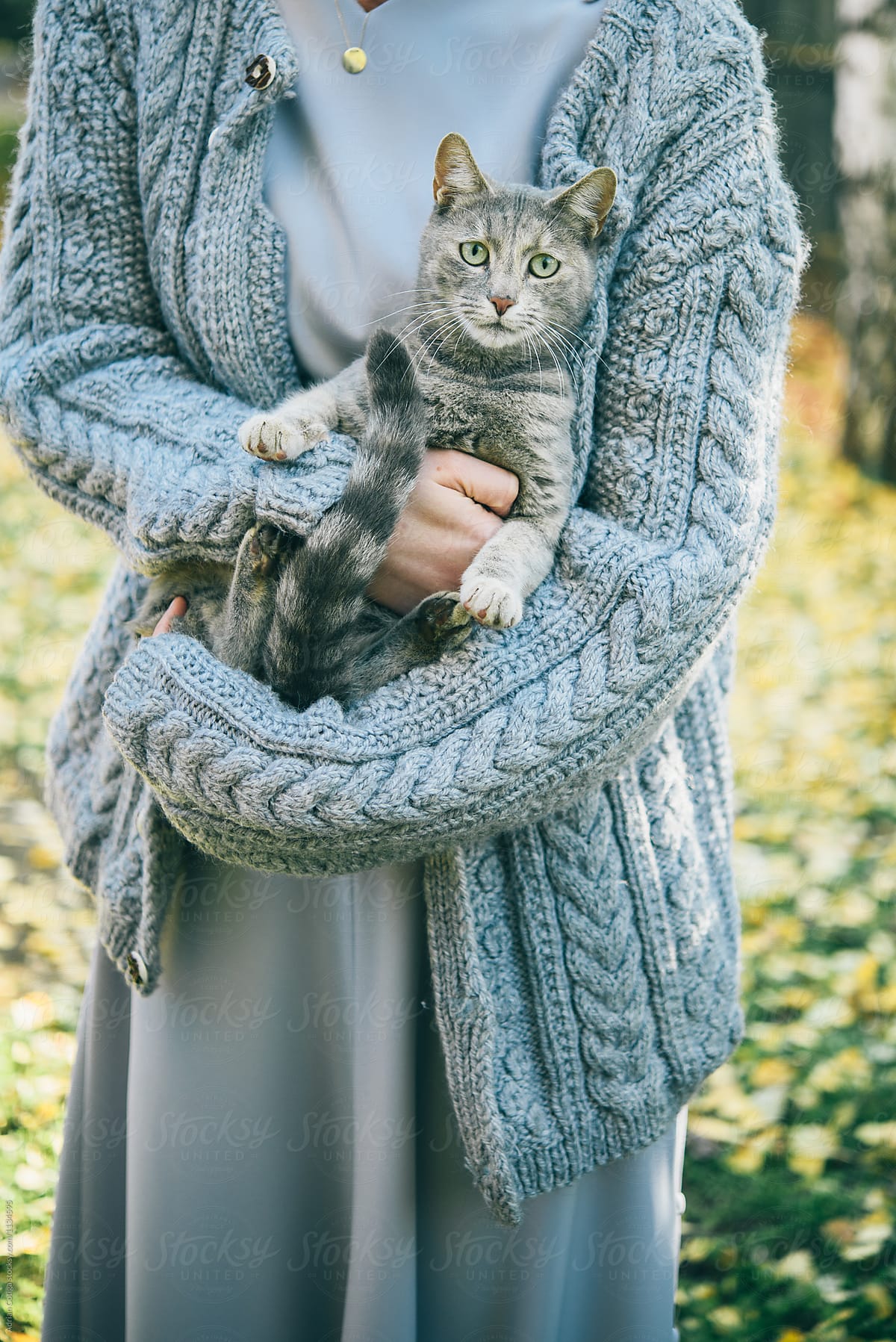 Woman holding a cat