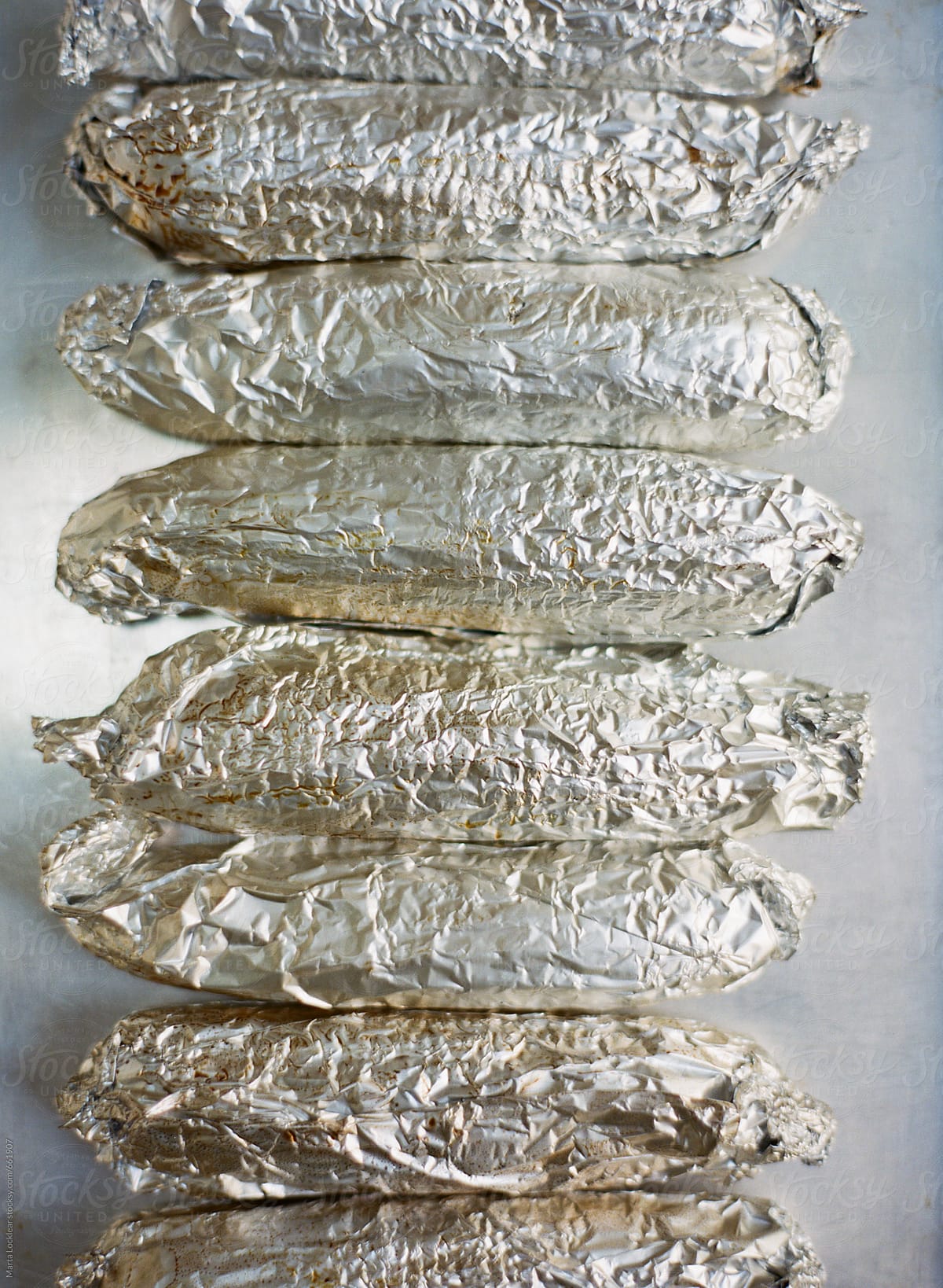 Corn on the cob cooked in aluminum foil