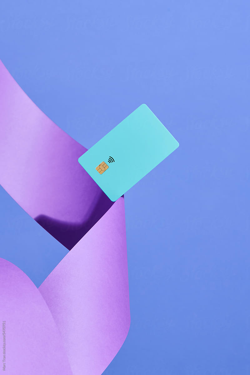 Color credit card flying on strip wave paper