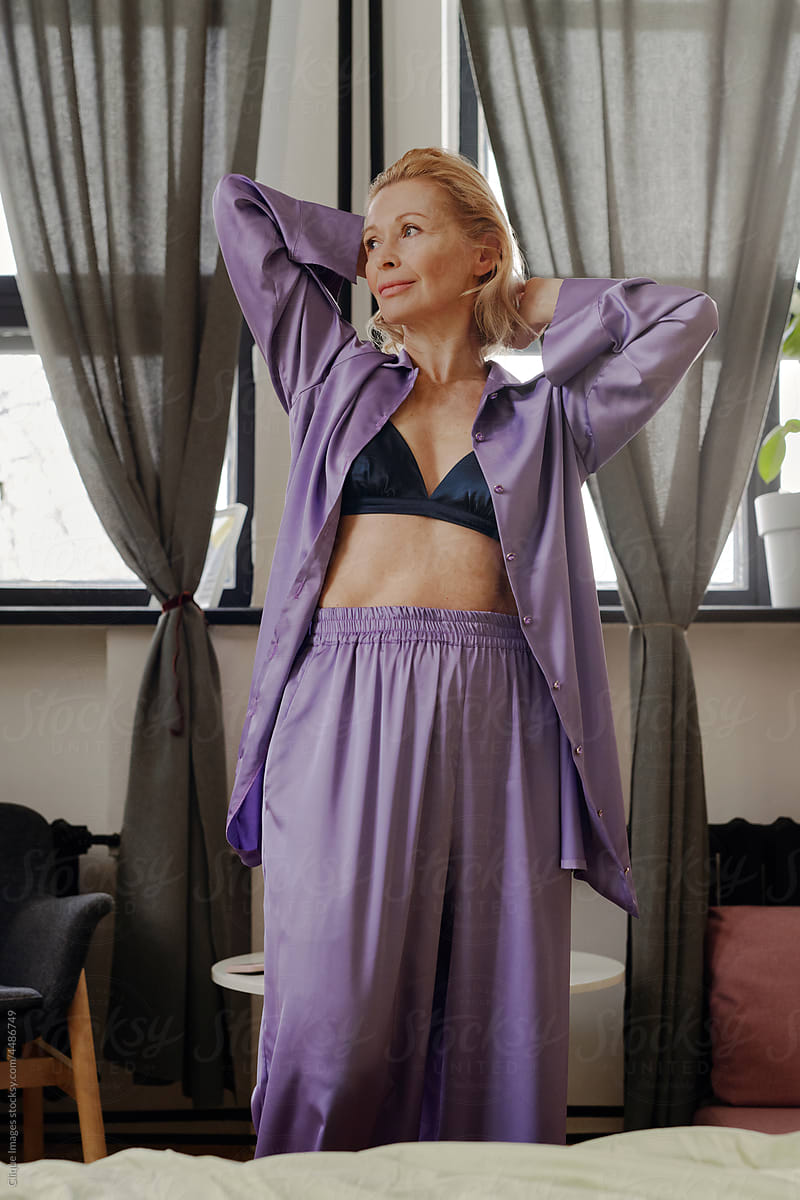 Senior Woman Wearing Bra And Pyjamas