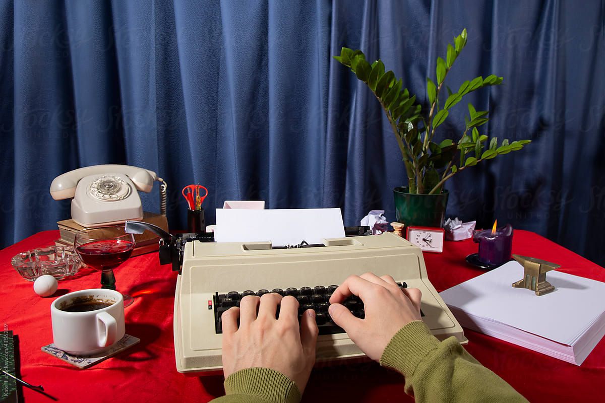 Office worker typing on typewriter / Still life