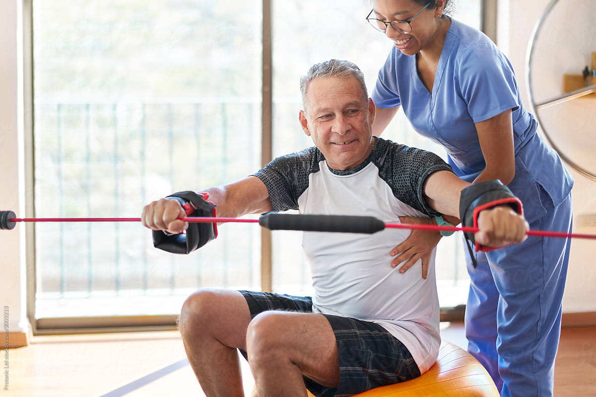 Healthcare: Physiotherapist and senior patient