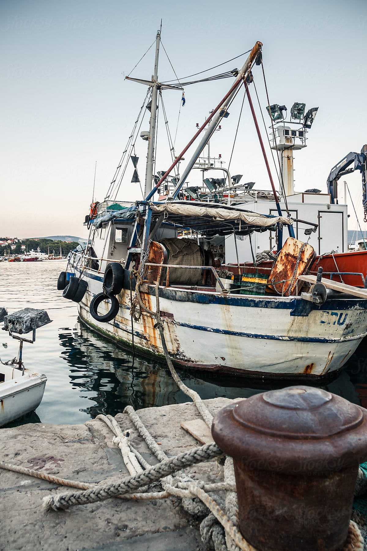 Old Dirty Fishing Boat In The Harbour by Stocksy Contributor