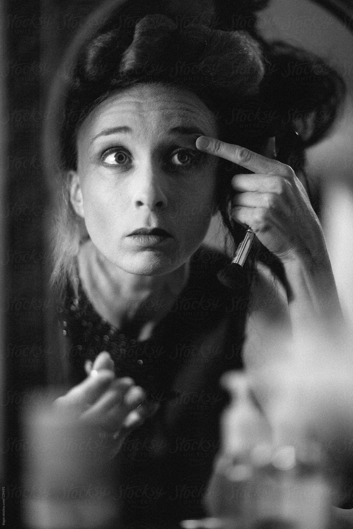 woman doing her stage make up