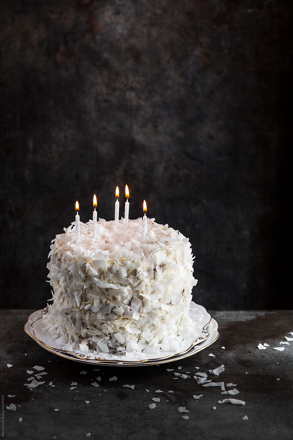 Coconut Flake Cake with candles