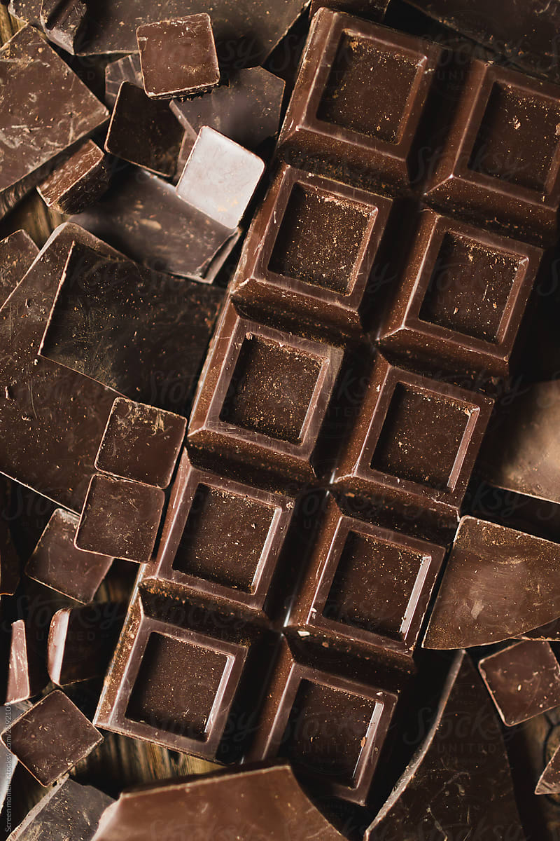 Chocolate chocolate chunks. Chocolate bar pieces. dark chocolate background.
