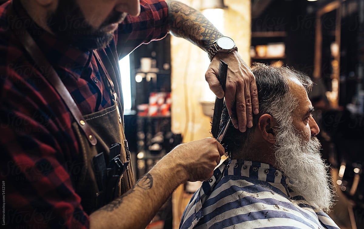 Hairdresser Cutting Man's Hair