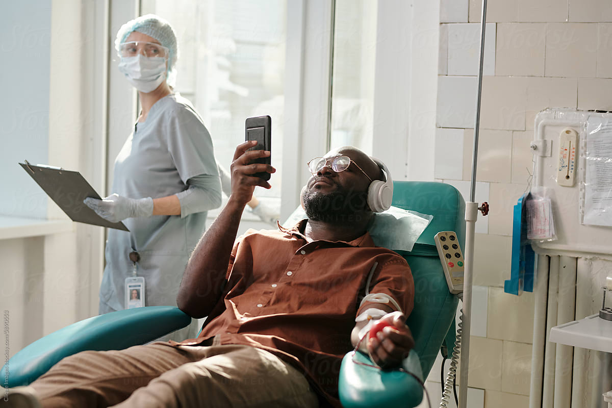 African American Man In Blood Donation Center