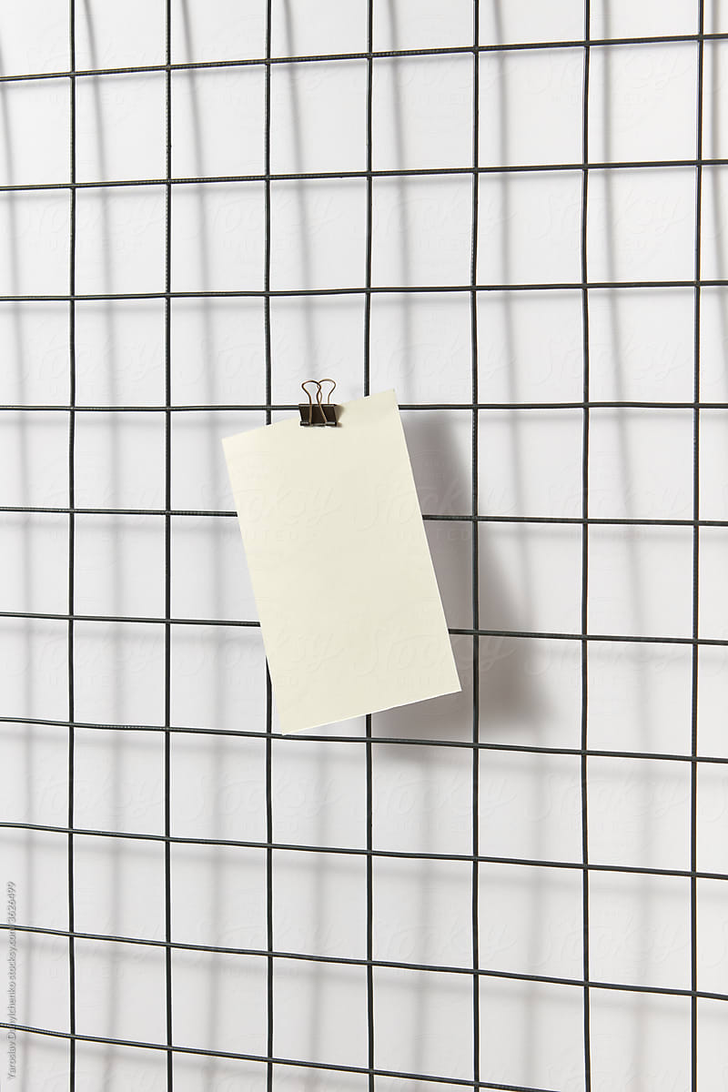 One white paper sticker on grid