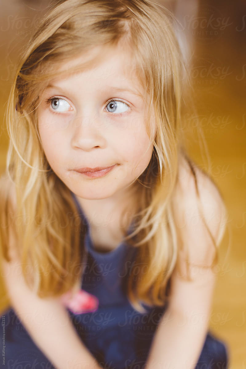 Young Girl Looking Sideways By Stocksy Contributor Jonas Räfling Stocksy