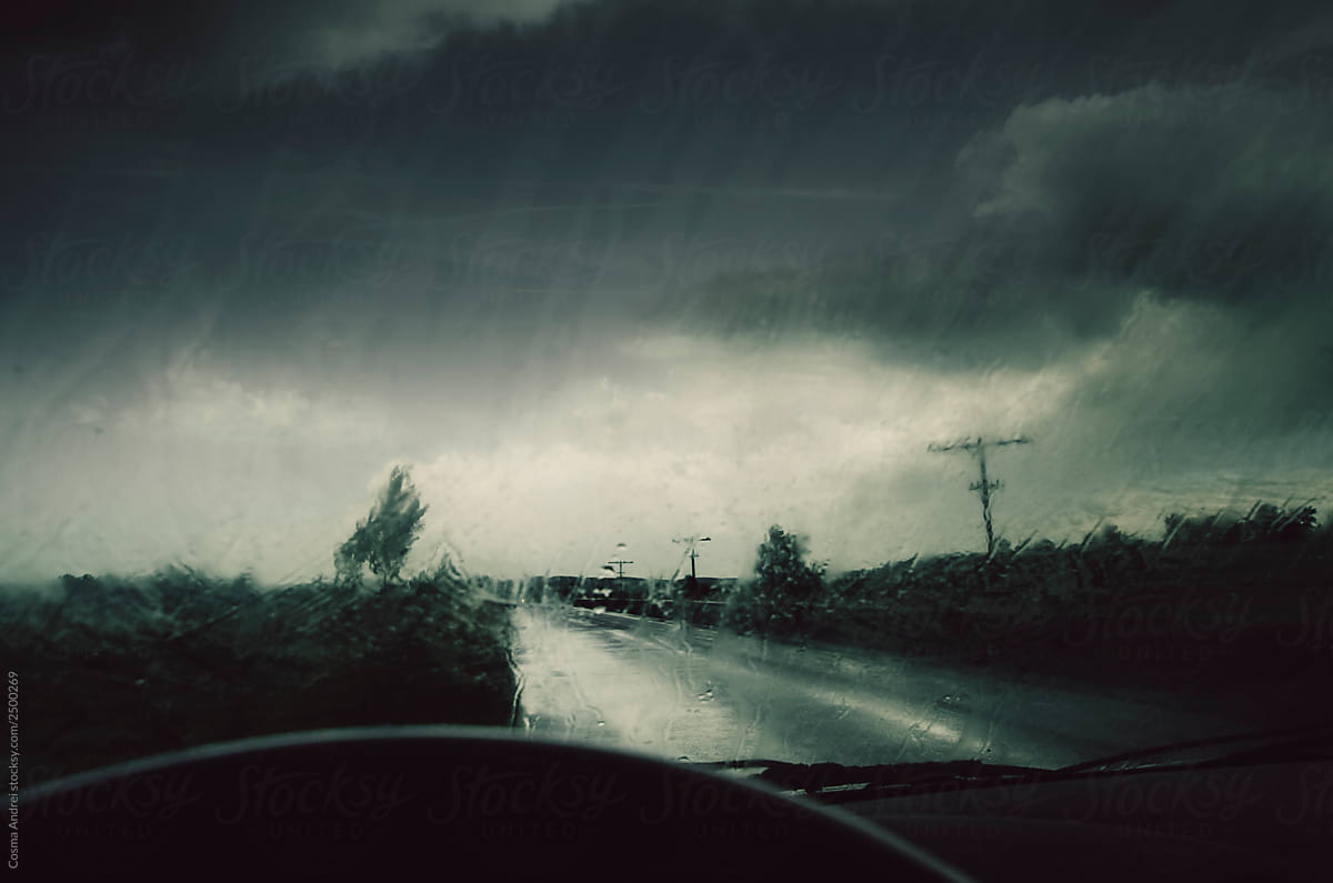 Dashboard rain on car windshield during storm