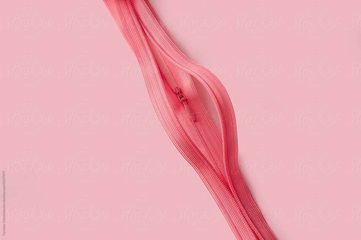 Two pink open zippers depicting abstract shape of female vagina