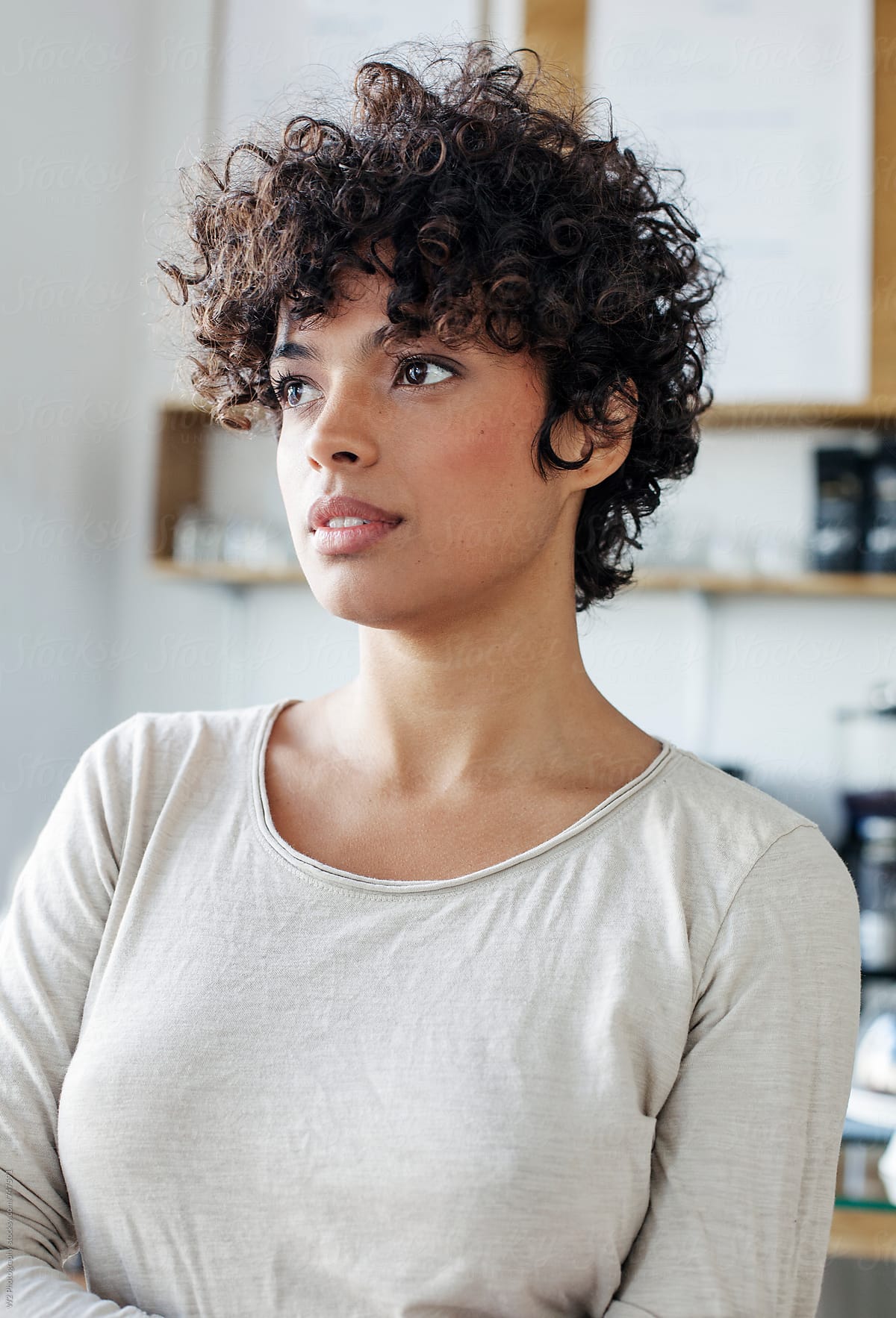 Natural Portrait Of Beautiful Woman With Curly Hair By Stocksy