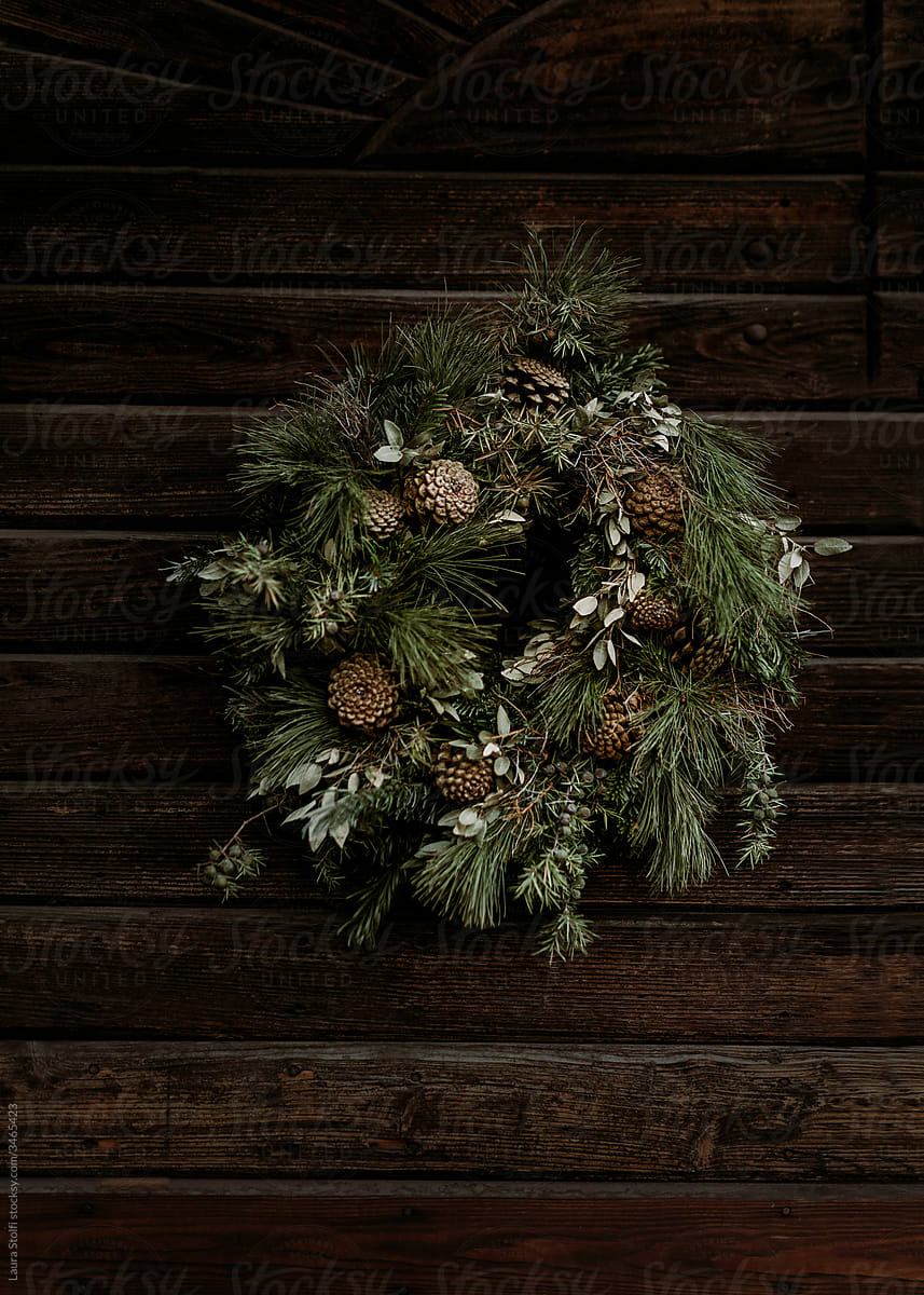 Spruce wreath on old wooden door