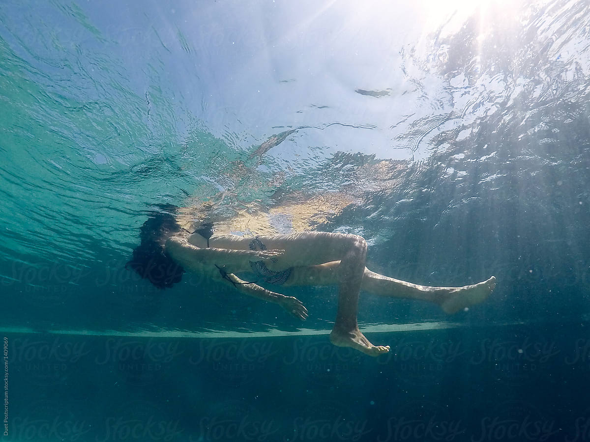 Side View Of Woman Underwater In Pool By Stocksy Contributor Duet Postscriptum Stocksy
