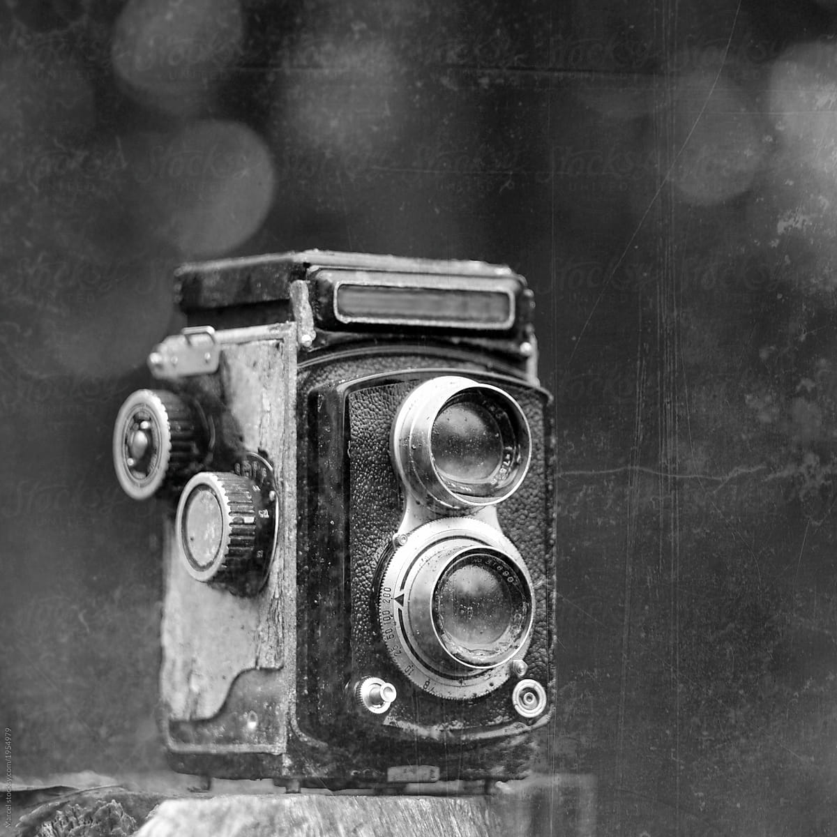 Grungy b&w photo of dirty old camera