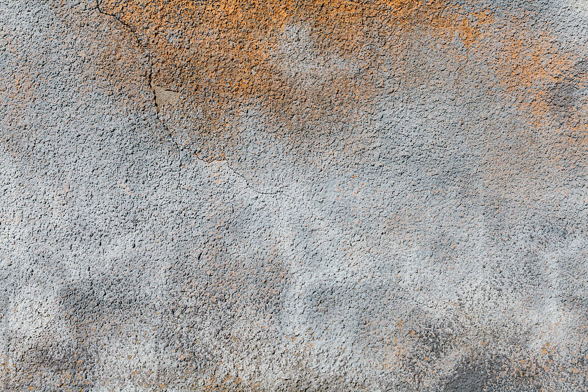 Texture of rusty oxidized stucco wall