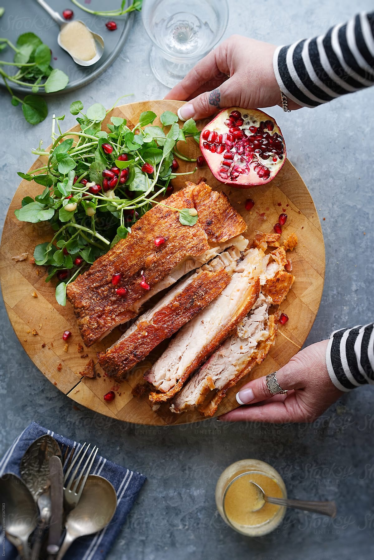 14 hours slow roasted pork belly with watercress and pomegranate salad.