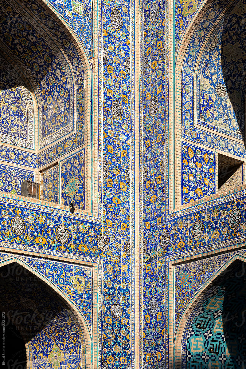 Colorful ornamental facade decorated in a Mosque of Isfahan, Iran