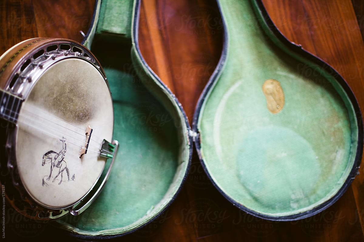 vintage open banjo case with banjo