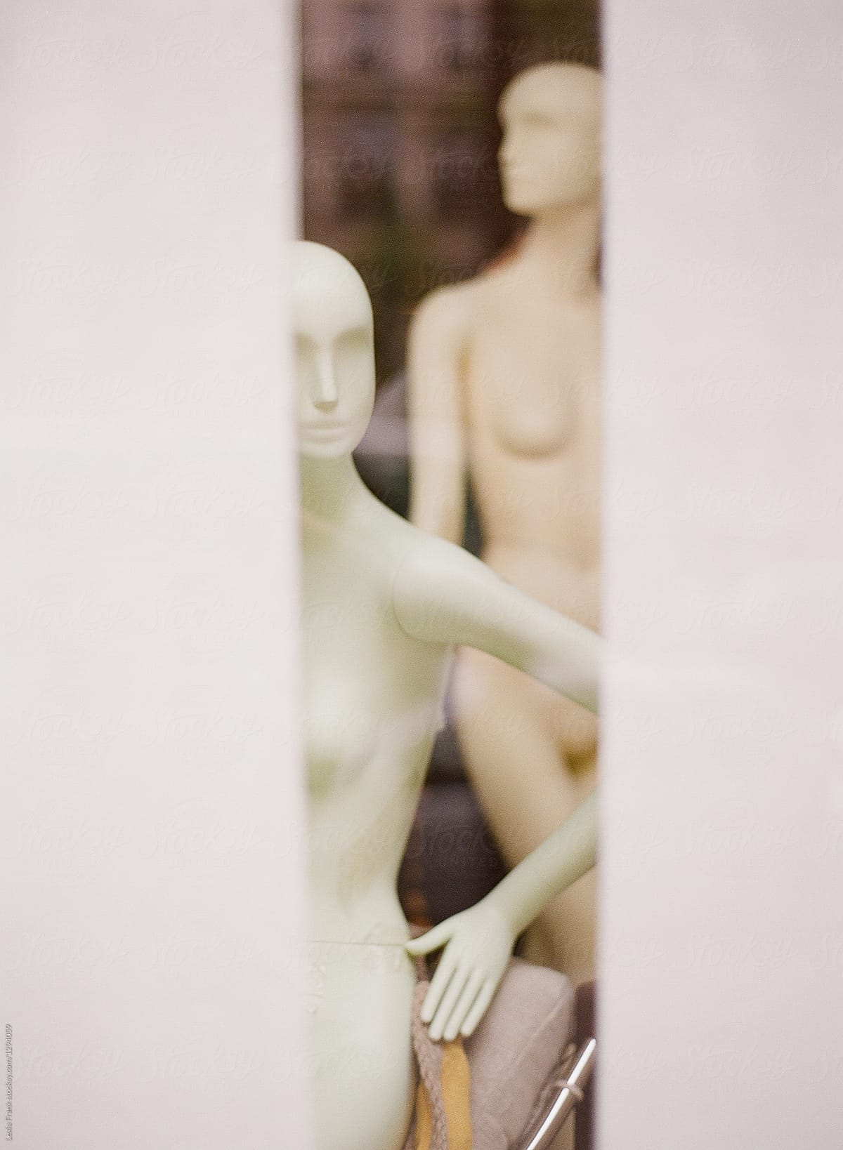 naked mannequins in a window display