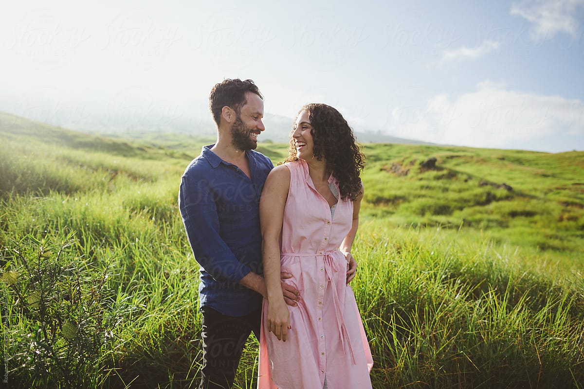 Young Couple Together Outside Laughing And Hugging In Nature By Stocksy Contributor Rob And 7382